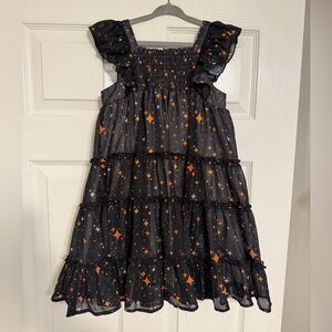 Girls Black Ruffle Tiered Dress with Orange Star Print Cheeky Plum